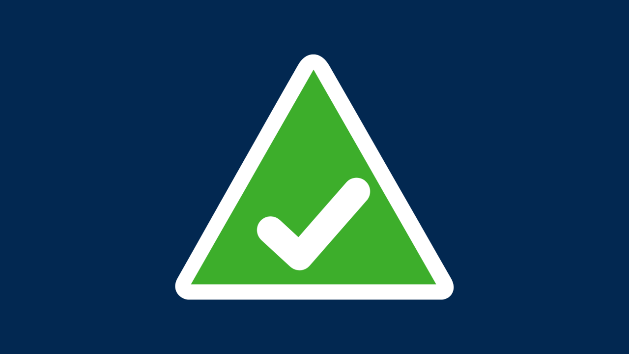 alert graphic green triangle