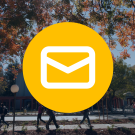 email icon over a photo of uc davis campus in the fall