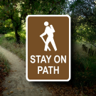 Arboretum path with "Keep on Path" sign